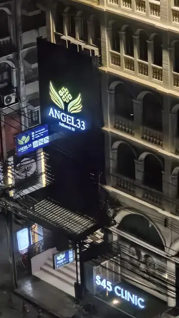 Angel 33: building with the lit sign