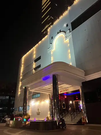Cupidy Soapy Massage: building at night