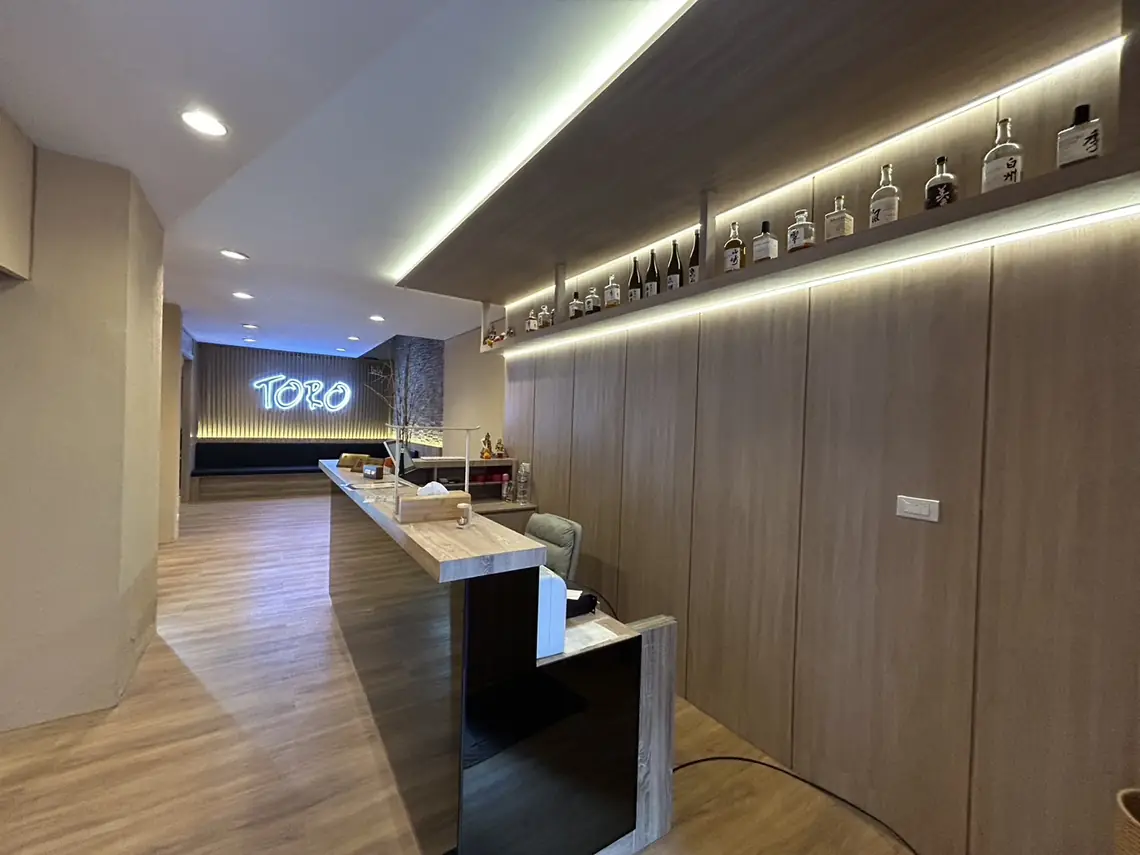 Photo: Google Maps via Google Maps Toro Massage: reception with the neon logo